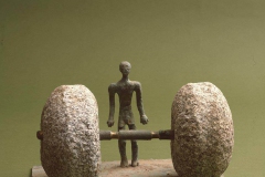 THE MAN AND THE BURDEN, 1973, bronze, granite